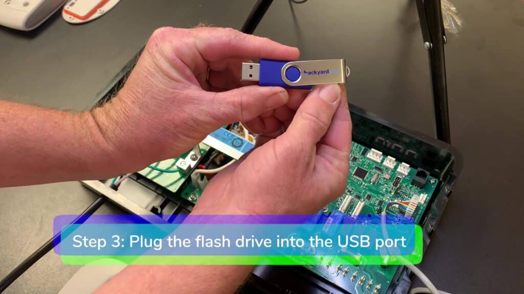 Step 3. Plug in the flash drive-