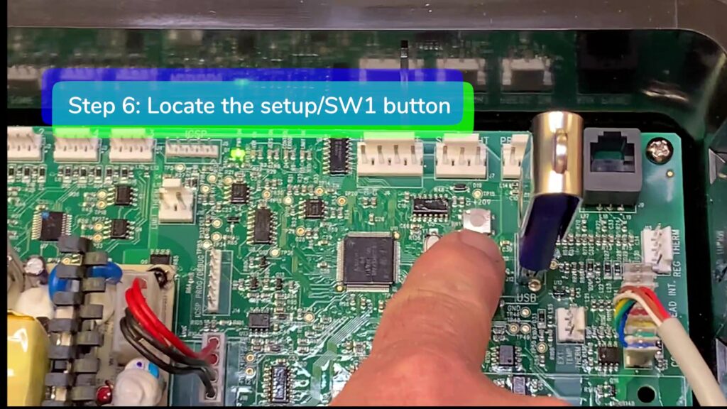 Step 6 Locate the SW1 button-