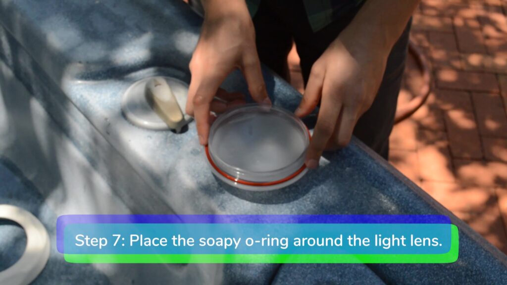 Step 7. Place the o ring around the light lens-