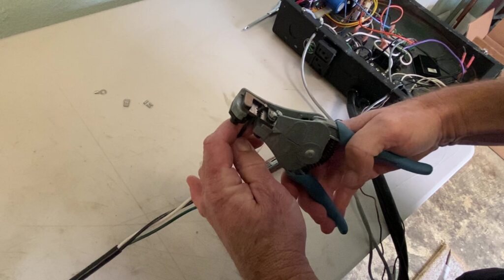 Step 7. Strip the wires with a wire stripper-